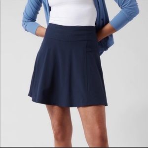 Athleta All Day Skort. Navy blue. Size 16. Zippered pocket in back waistband.